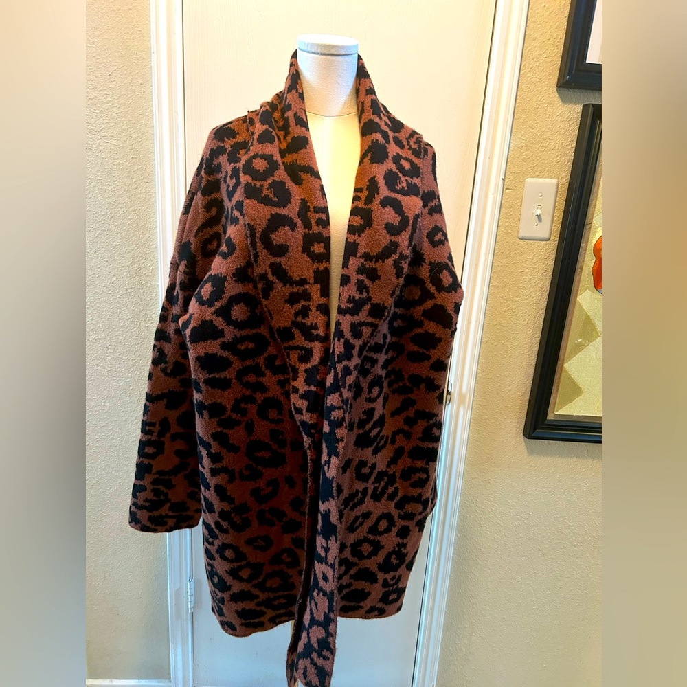Sweater dark orangee and black animal print. Size 20